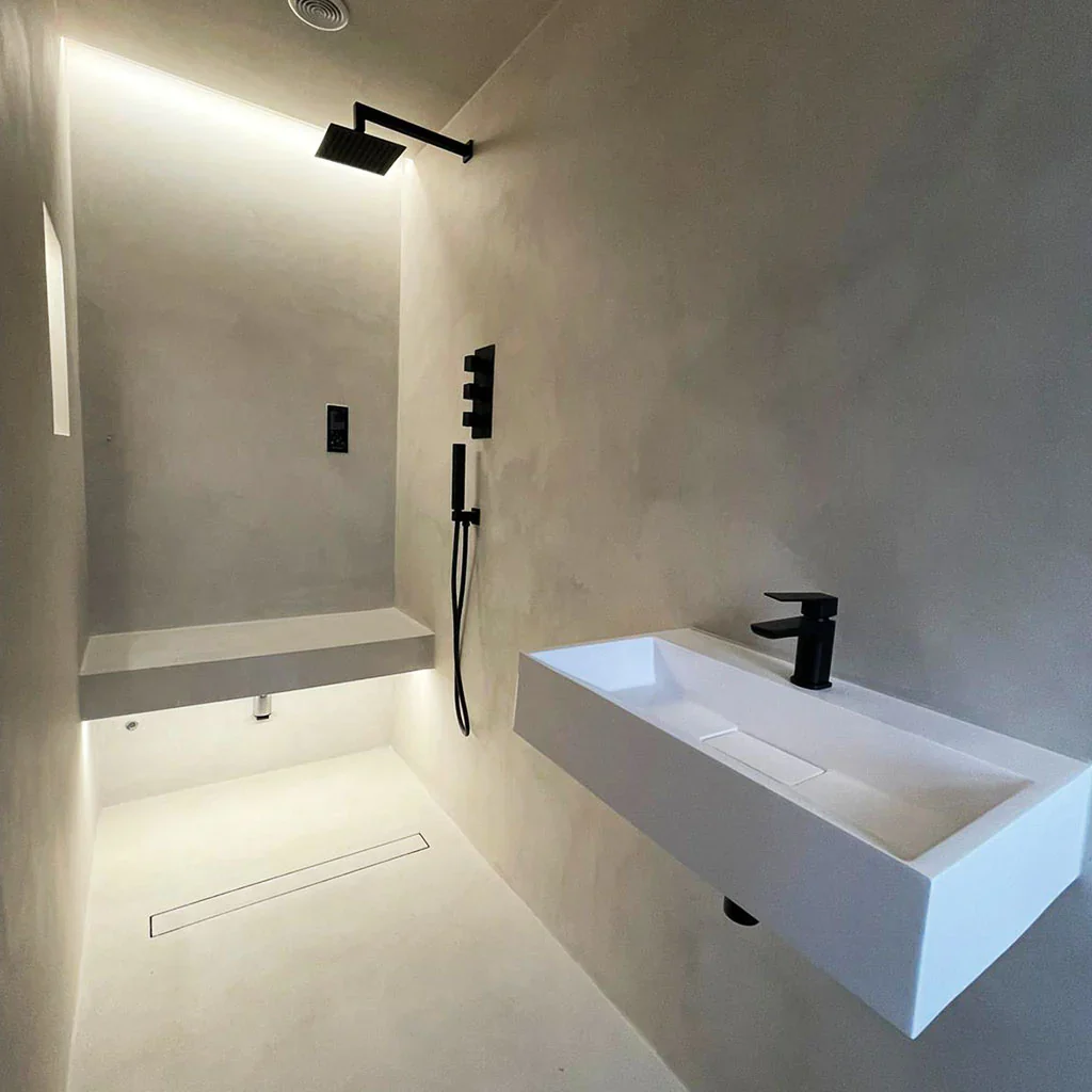Microcement bathroom with warm brown tones
